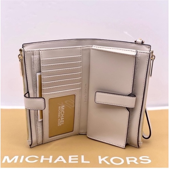 MICHAEL KORS LG
DOUBLE ZIP
WRISTLET
WALLET PHONE
HOLDER LIGHT
CREAM MULTI - Picture 11 of 12